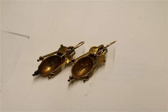 A pair of Victorian yellow metal and garnet set tapered earrings, overall incl. wire 40mm.